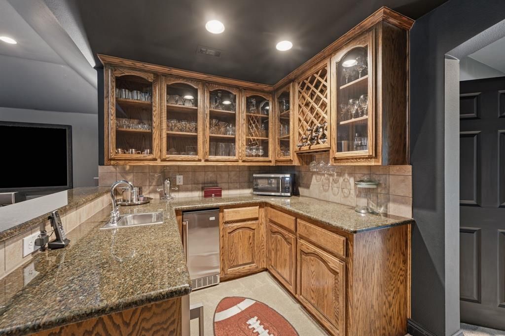 Media room wet bar with wine storage